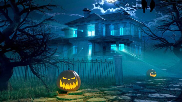 Carved pumpkins and Halloween decorations in a fall setting