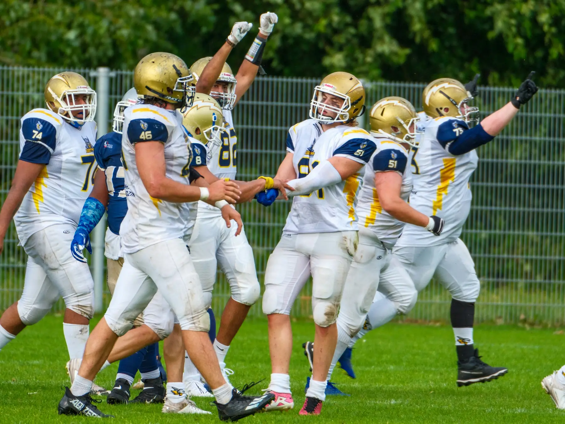 American football team celebrating