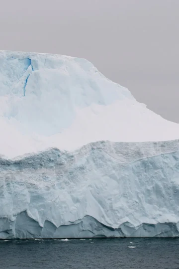 Massive Antarctic iceberg floating in polar waters