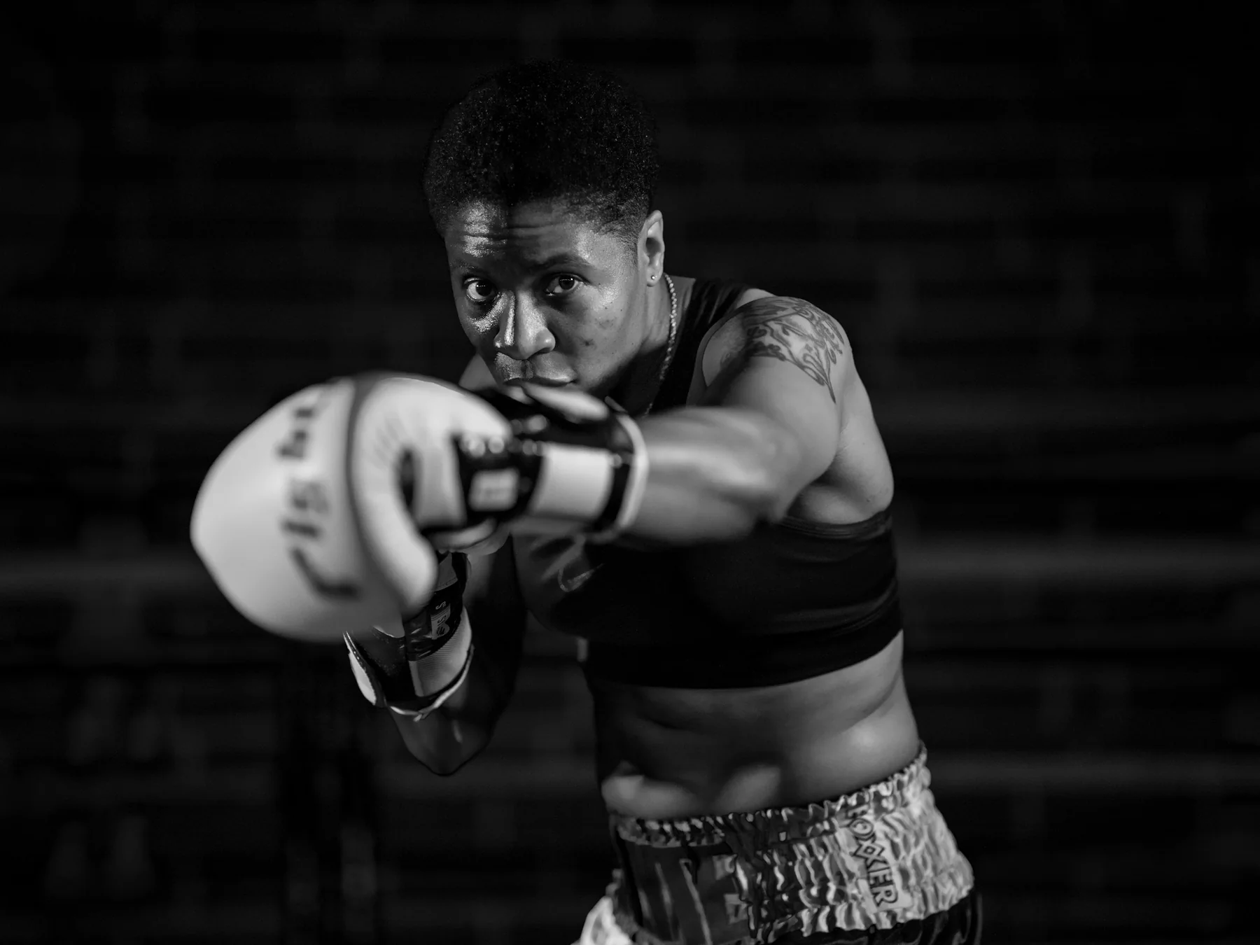 Female boxer wearing gloves