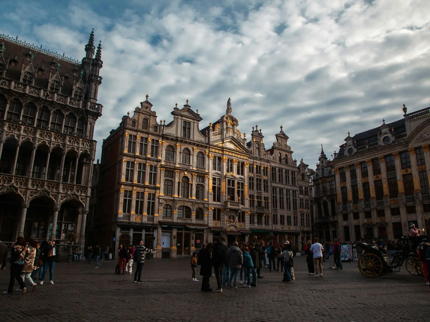 Ornate historic guildhalls surrounding Grand Place in Brussels, Belgium