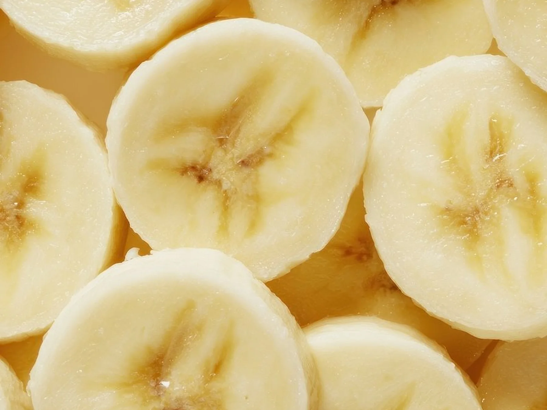Close-up view of freshly sliced banana rounds