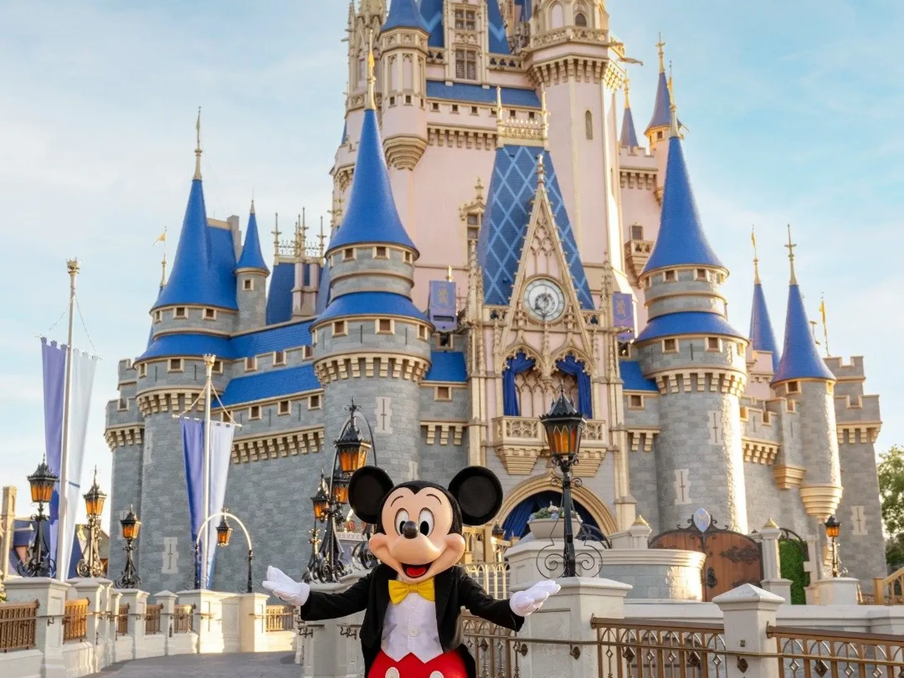 Mickey Mouse welcoming visitors at Cinderella Castle