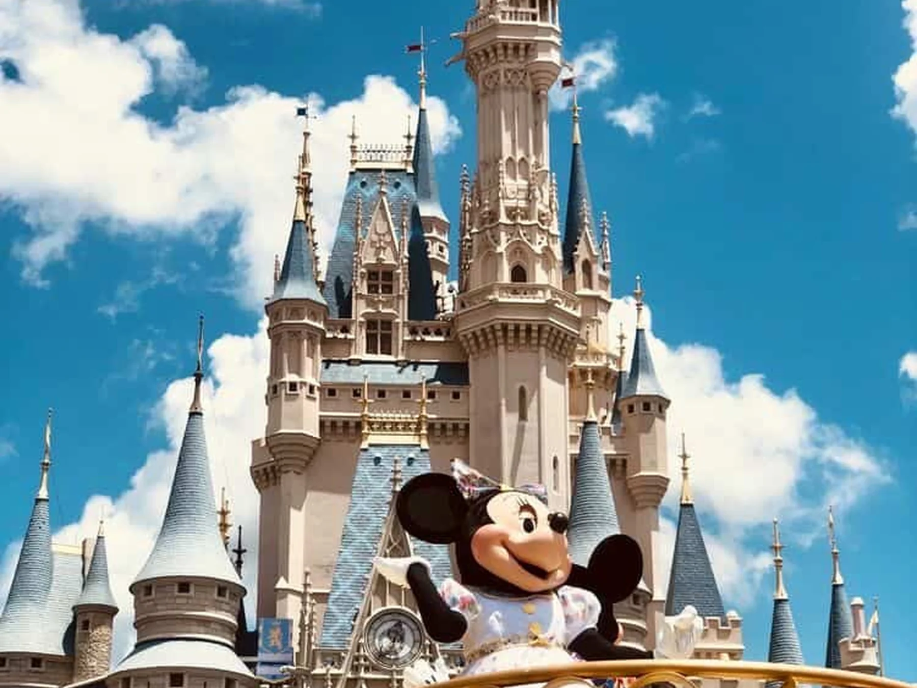 Mickey Mouse appearing near Cinderella Castle