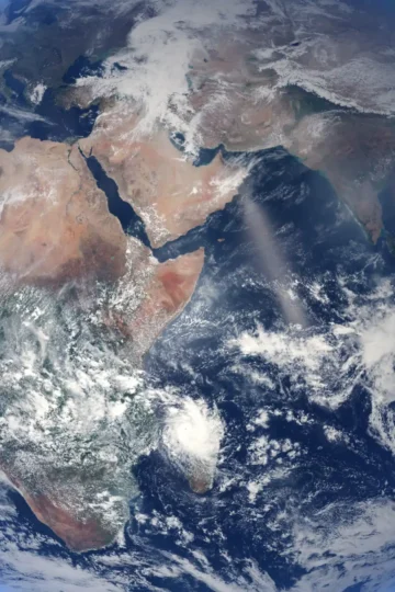 Full-disk view of Earth showing Africa, Europe, Asia, oceans, and clouds