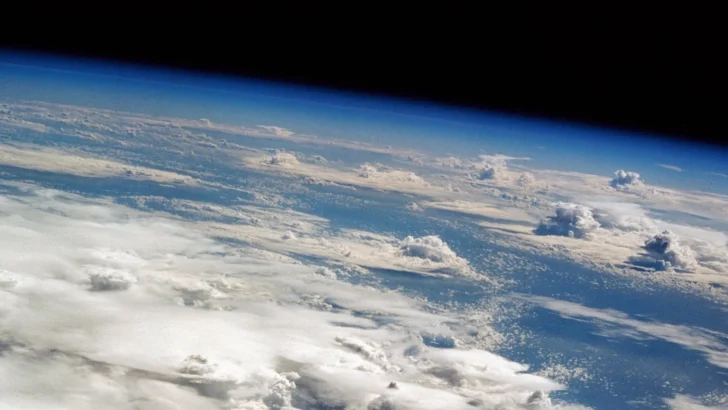 Curved horizon of Earth showing the thin blue atmosphere