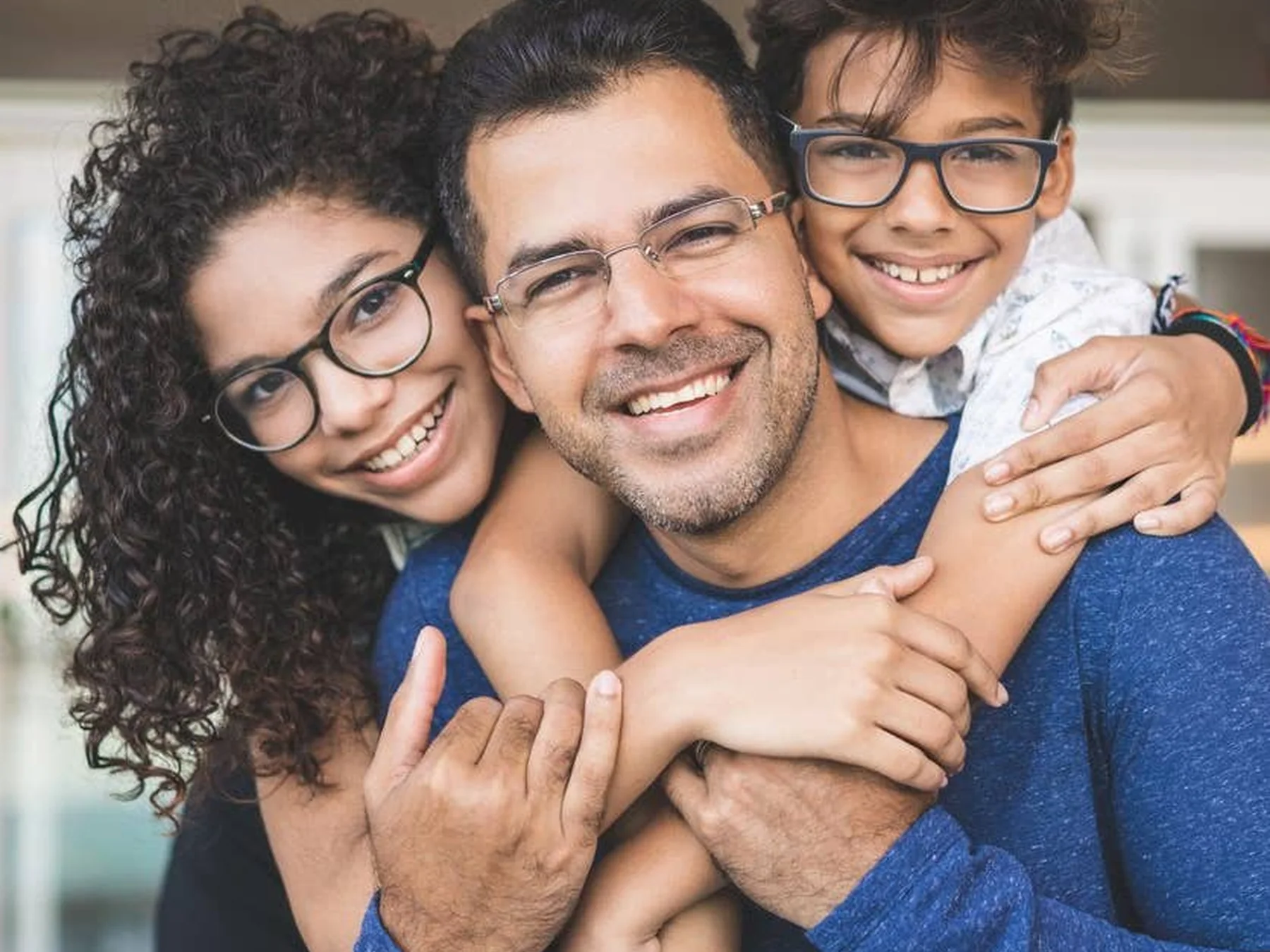 Father and children posing together for a family photo