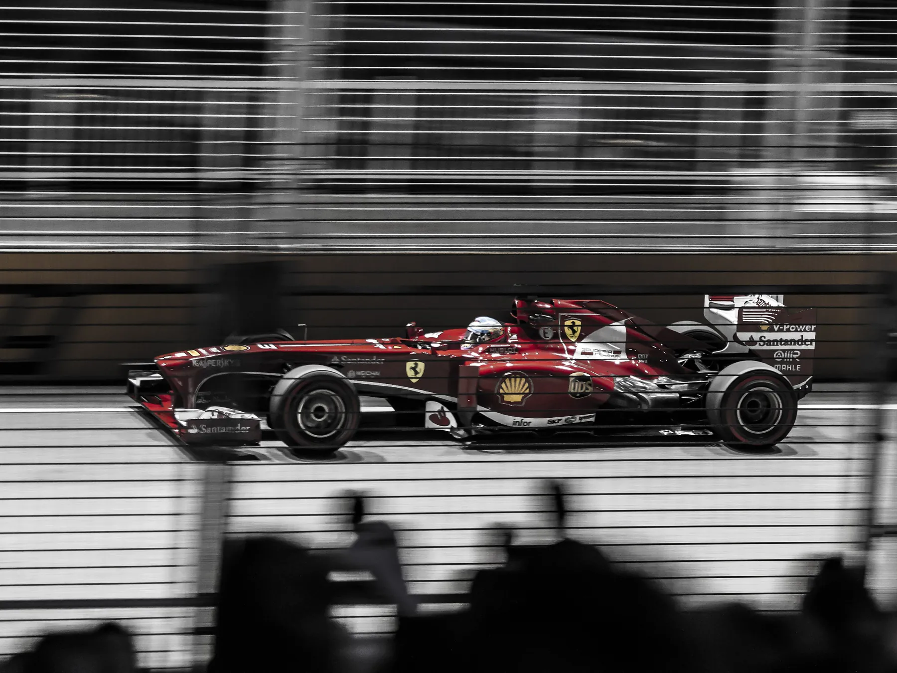 Formula One race car speeding along a track