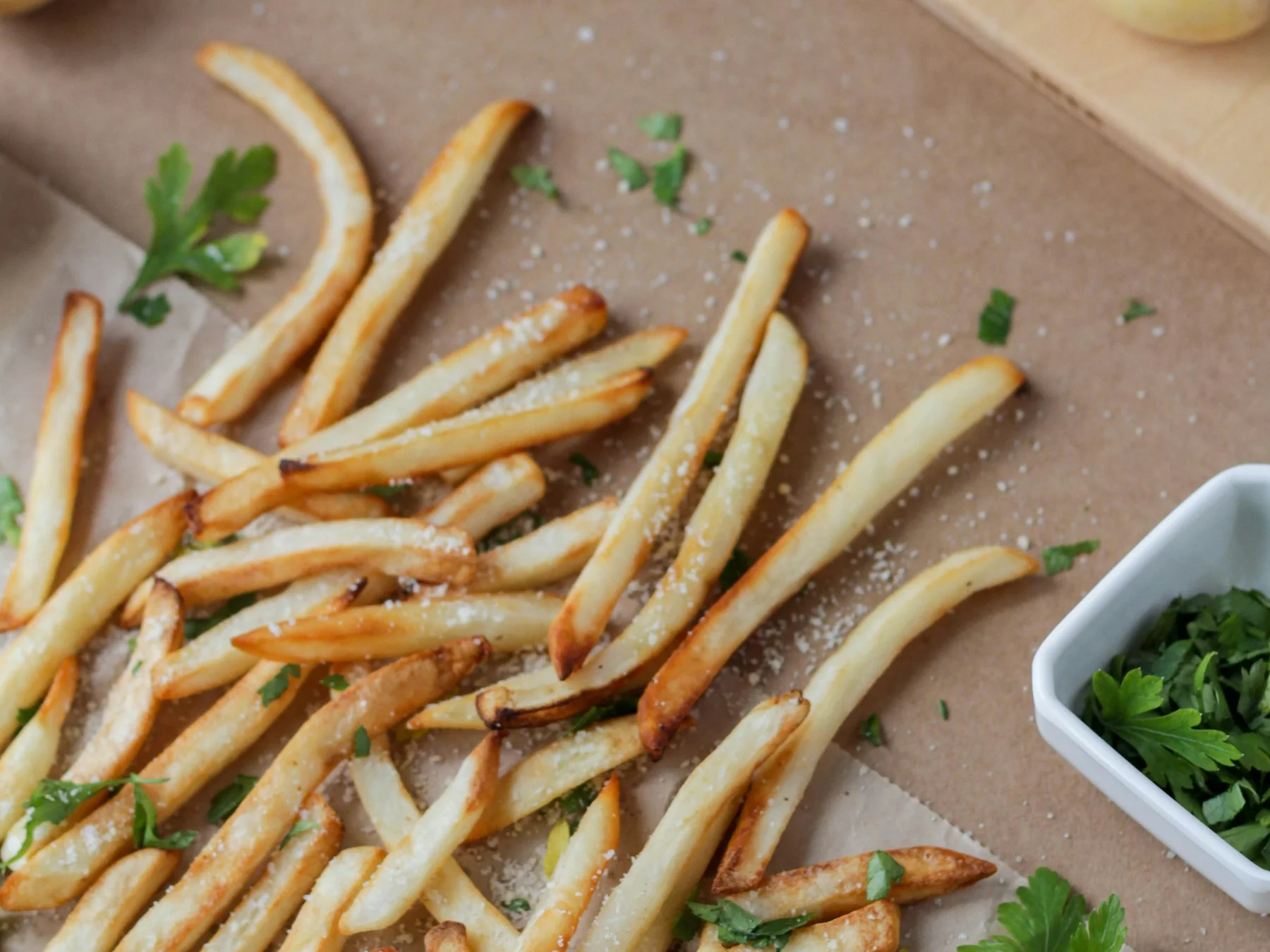 French fries spread across a serving tray
