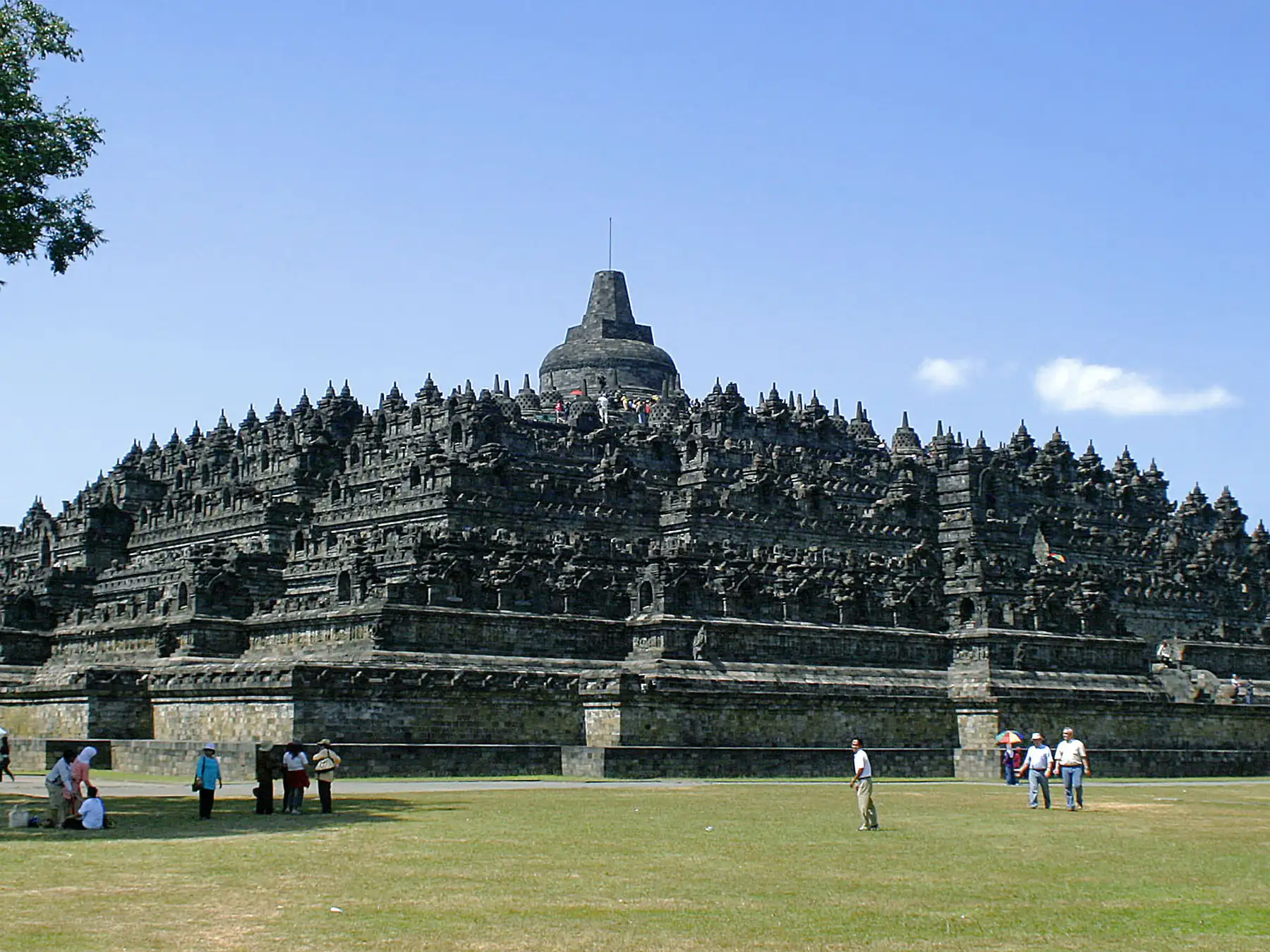 Borobudur Buddhist temple in Indonesia under a blue sky