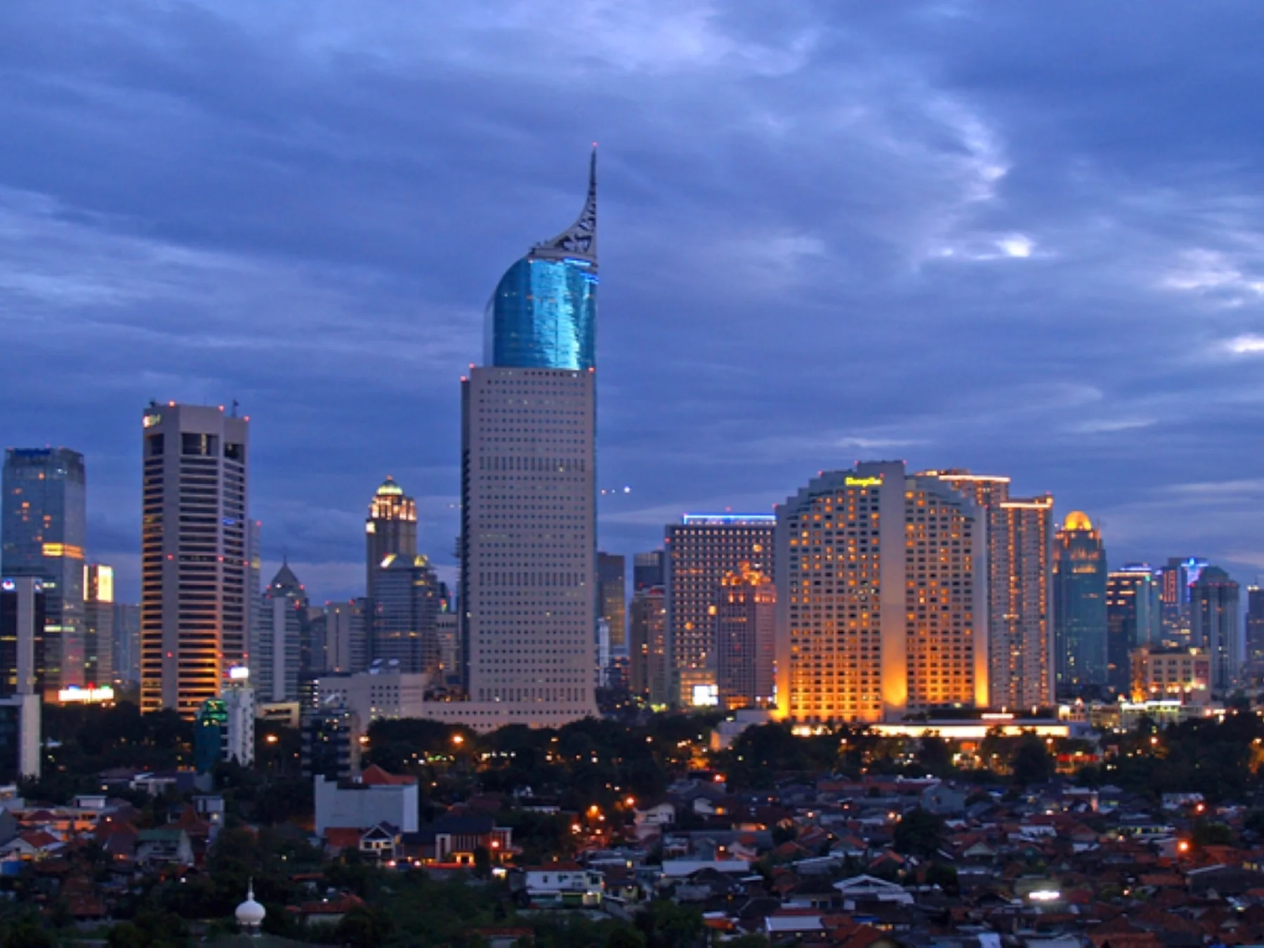 Jakarta city skyline illuminated at dusk