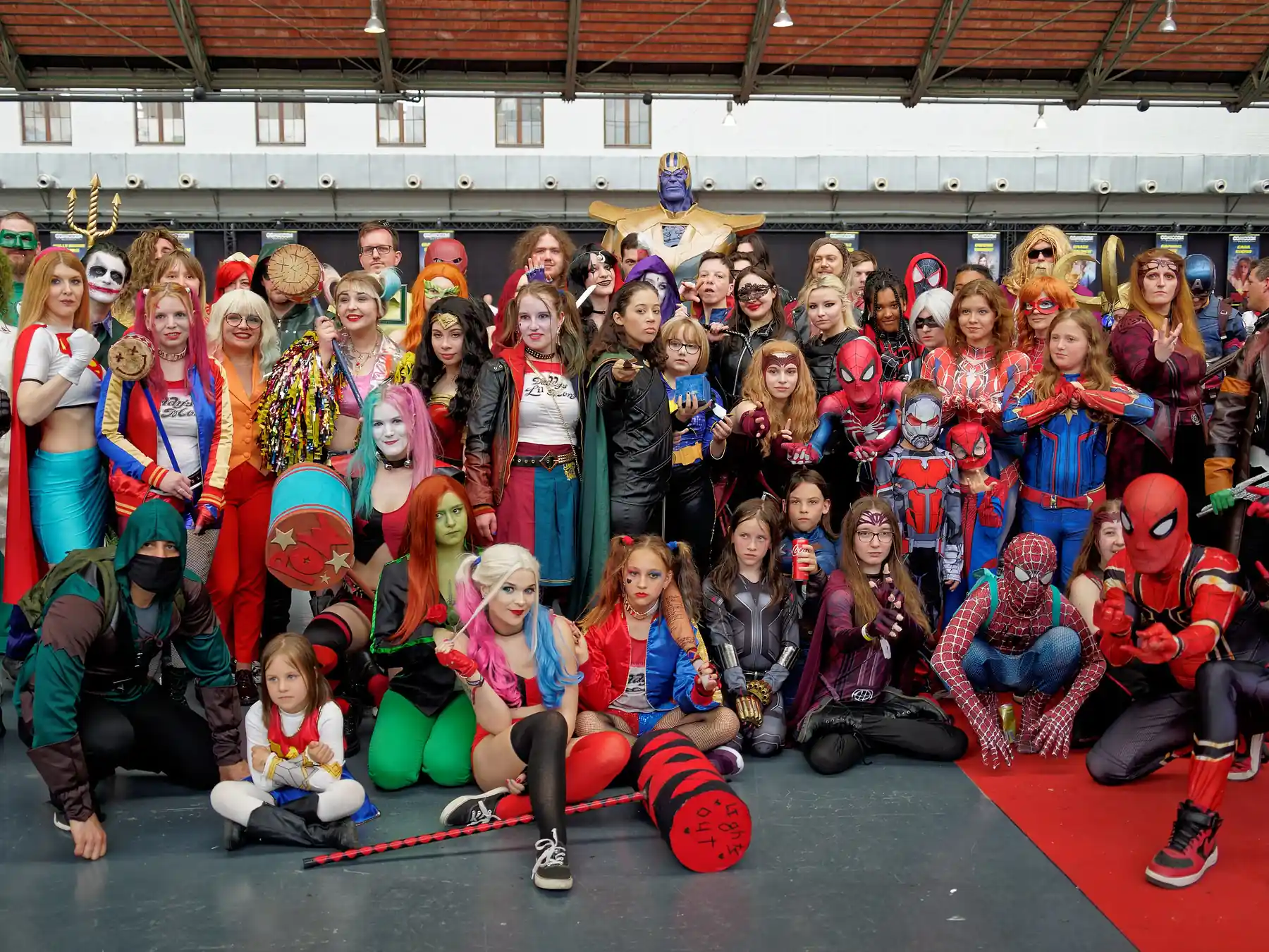 Group of Marvel superhero cosplayers at a convention