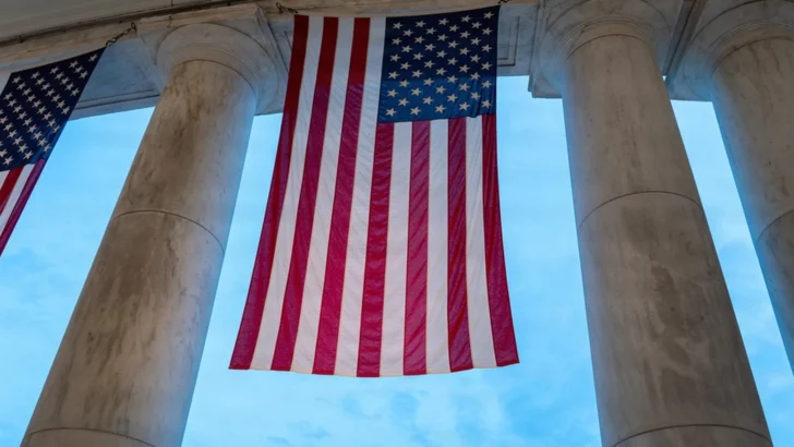 American flags displayed at a national memorial honoring military service