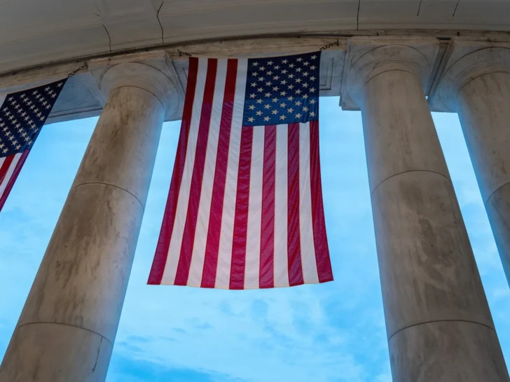 American flags hanging at a national memorial