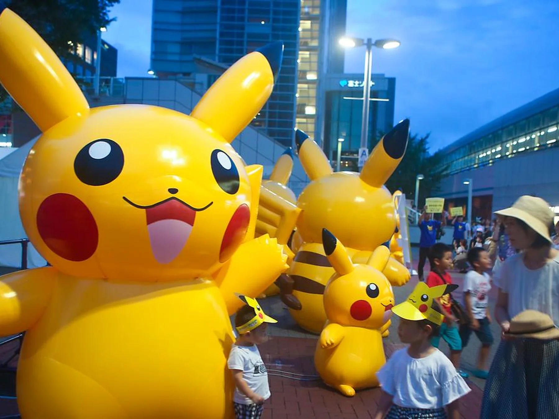 Large Pikachu mascot among a crowd