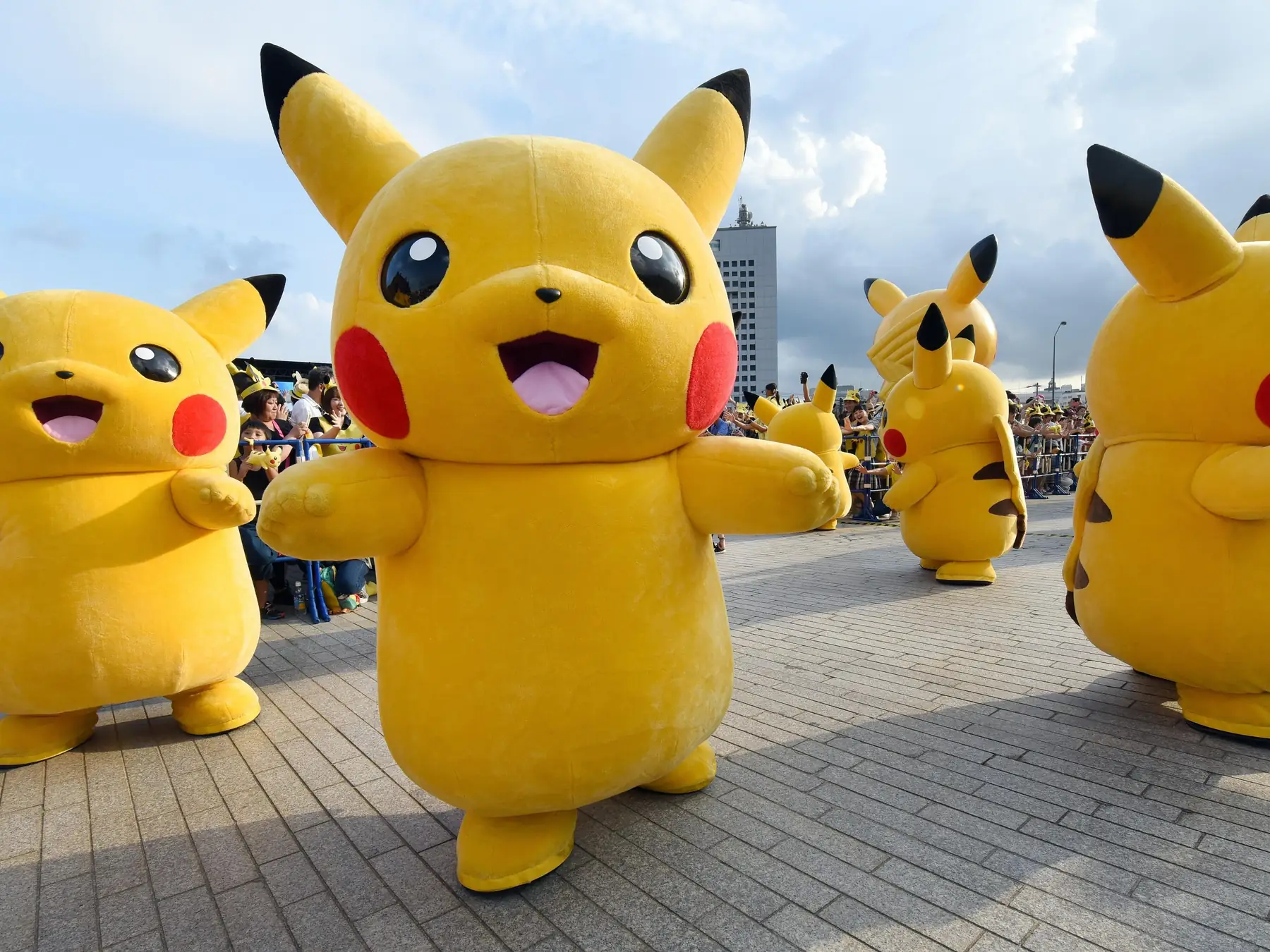 Group of Pikachu mascots outdoors