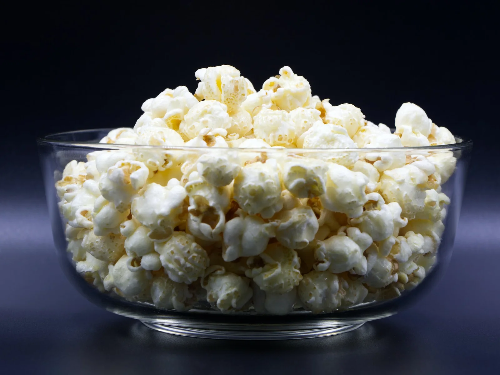 Glass bowl filled with popcorn