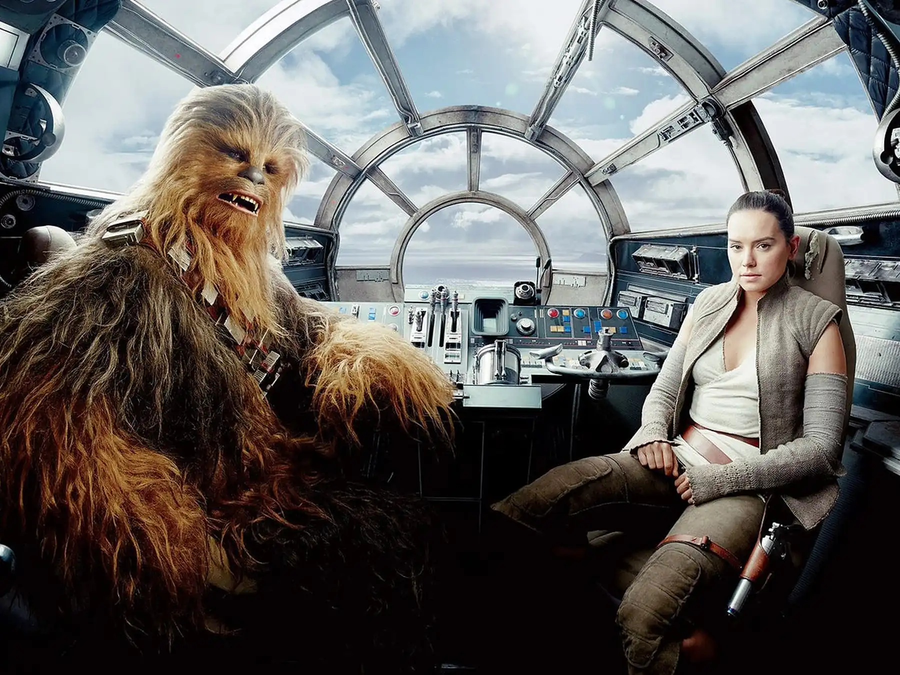 Chewbacca and Rey inside the Millennium Falcon