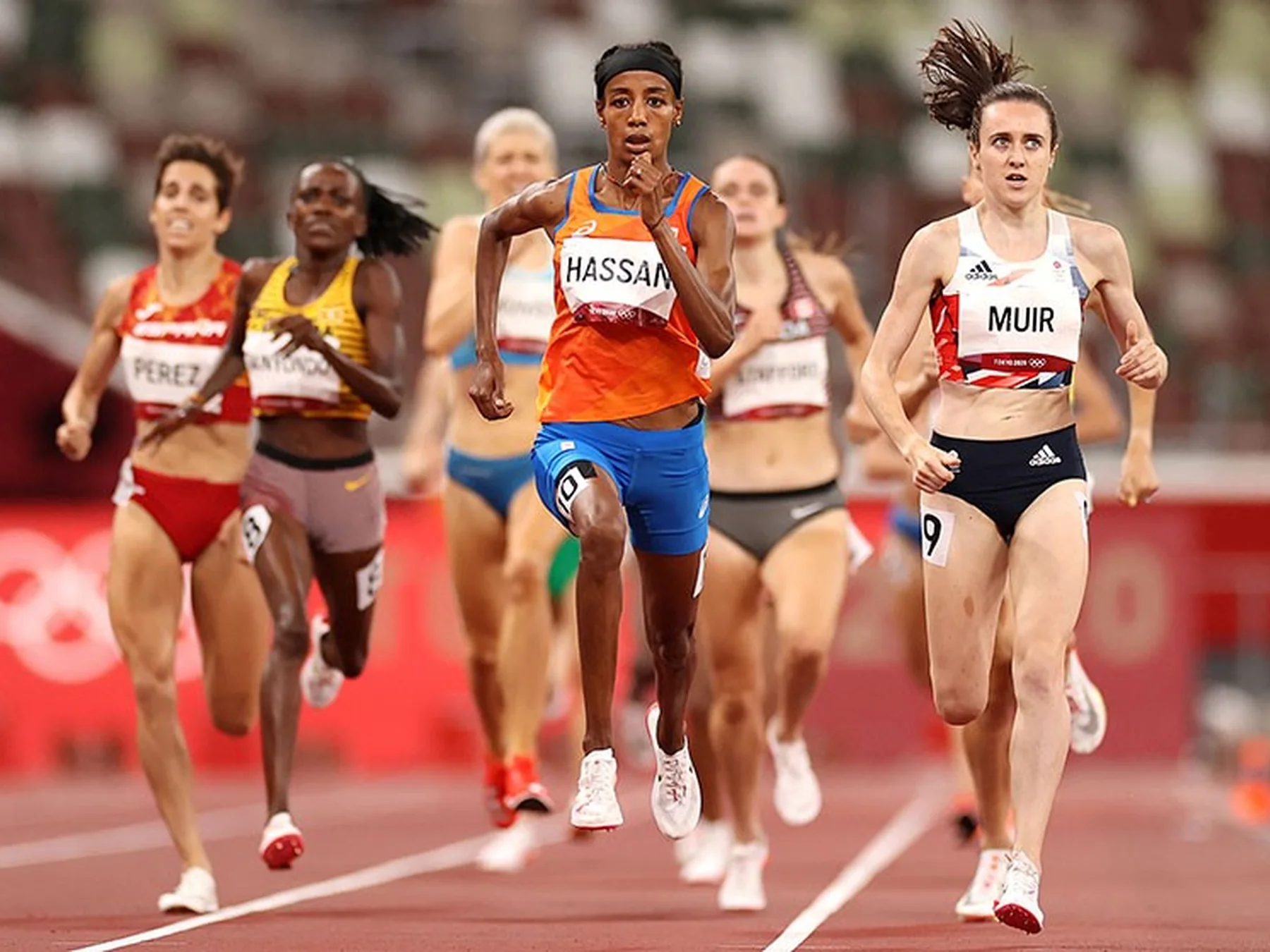 Elite runners competing in an Olympic track race
