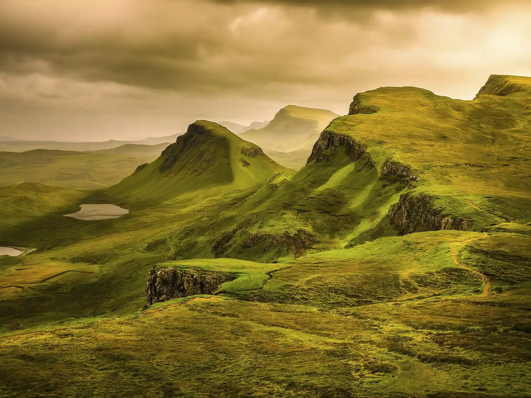 Green peaks and valleys across the rugged Scottish Highlands