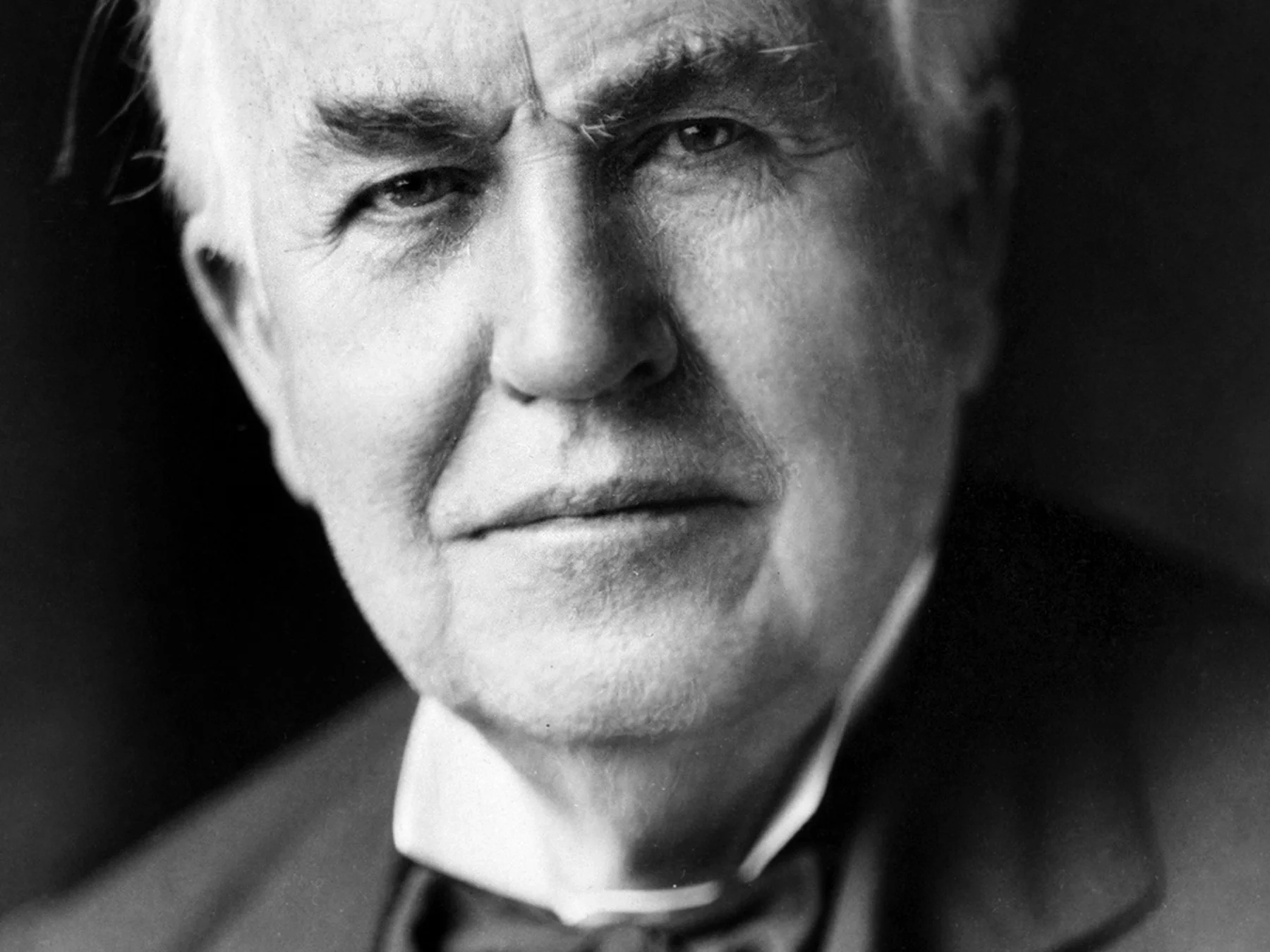 Close-up black-and-white portrait of Thomas Edison
