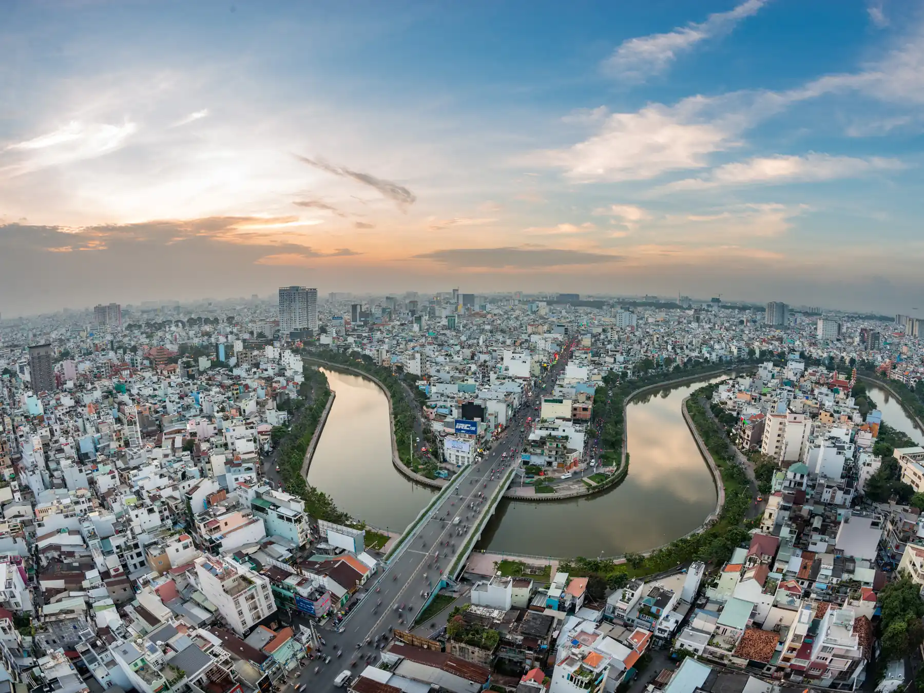 Dense city neighborhoods and waterways in Vietnam