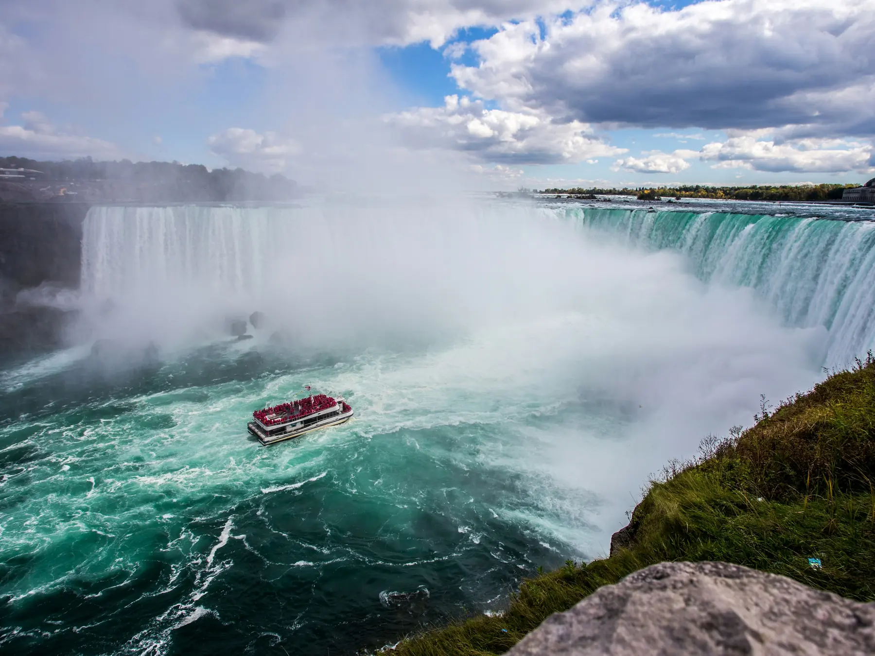 Tour boat approaching the mist below Horseshoe Falls