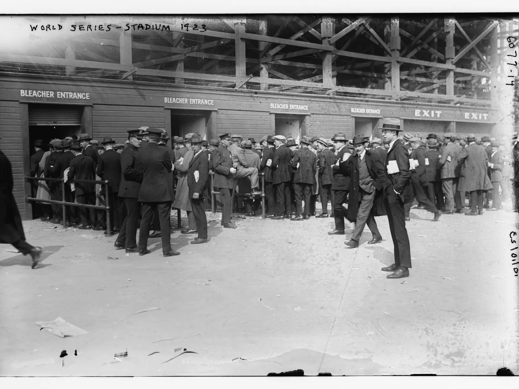 Crowd waiting at a stadium entrance during a historic World Series