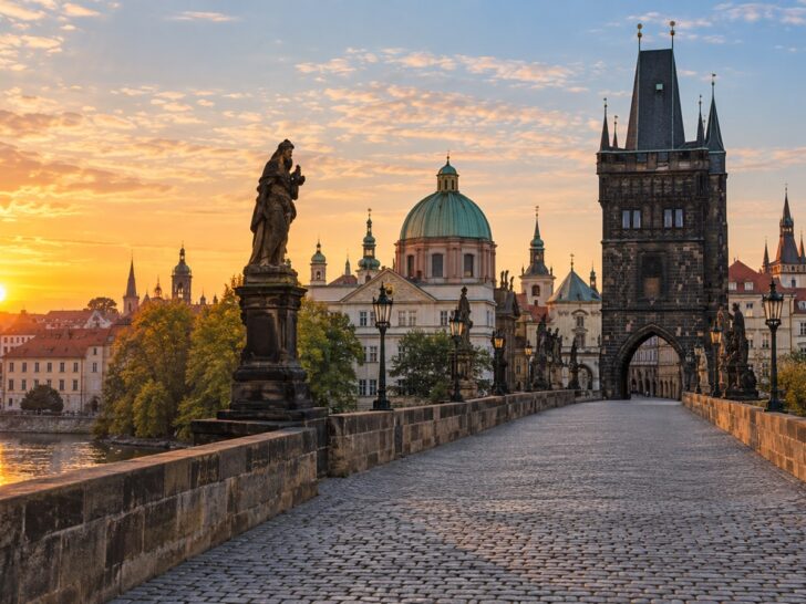 Prague Charles Bridge and historic skyline at dawn, no people