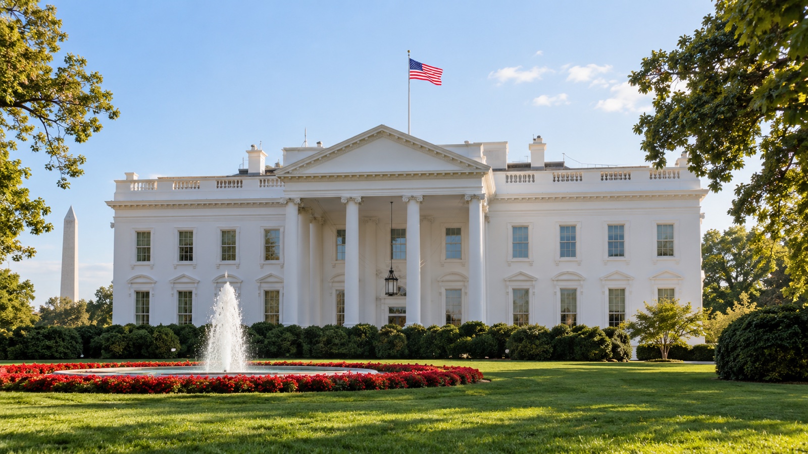 White House exterior with American flag on a clear Washington morning