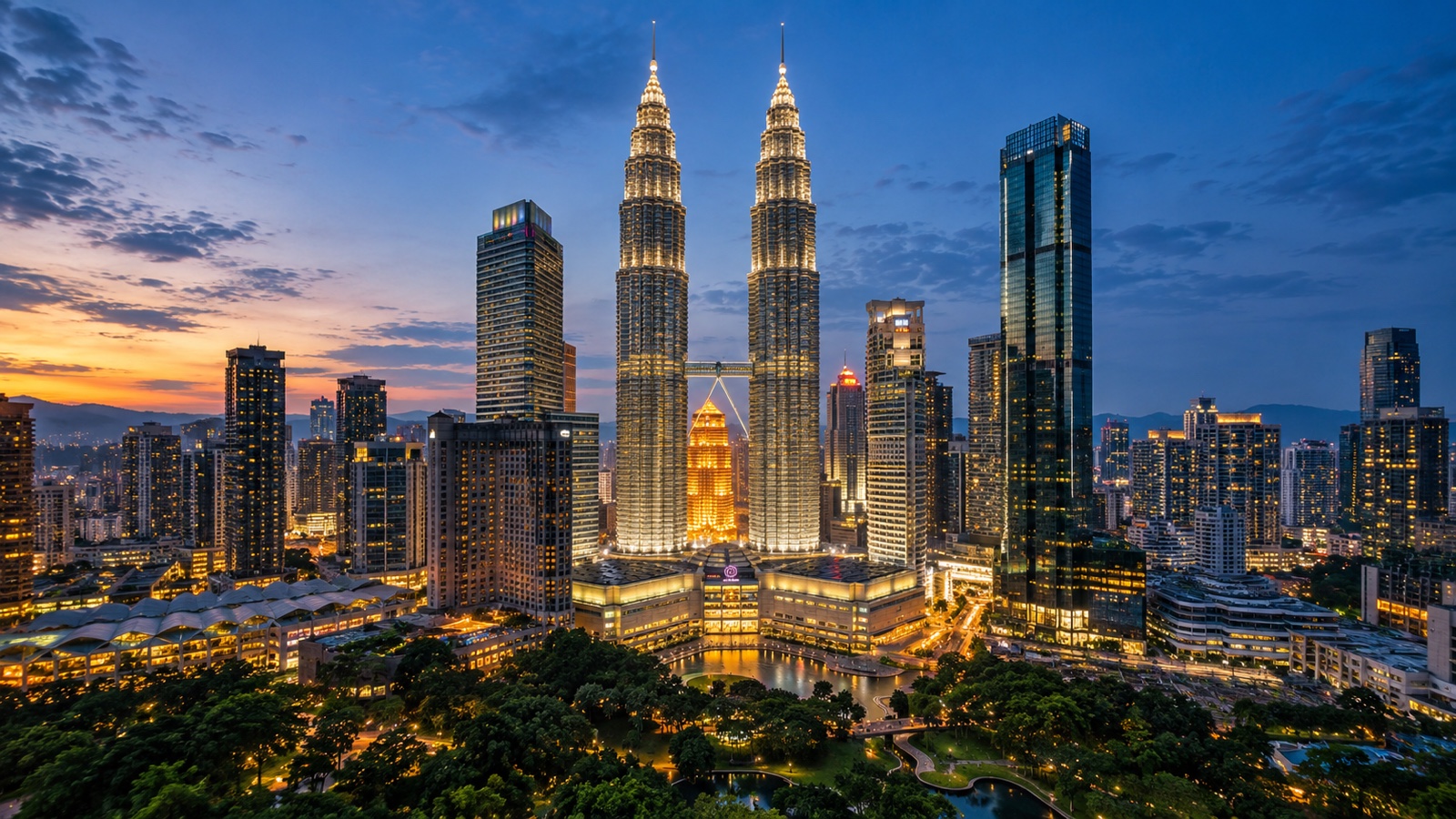 Petronas Twin Towers above Kuala Lumpur skyline at blue hour