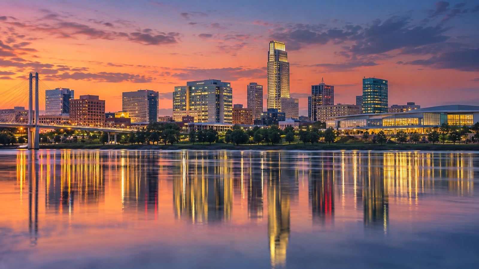 Omaha skyline reflected in the Missouri River at dusk.